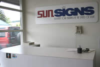 Sunsigns slogan: "Brighten Your Business At The Speed Of Light" photo of the front reception area
